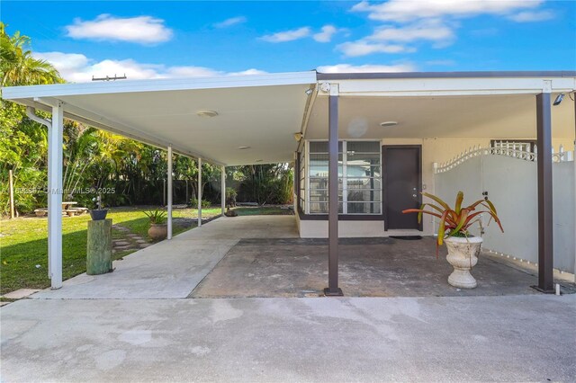 view of patio / terrace featuring a carport