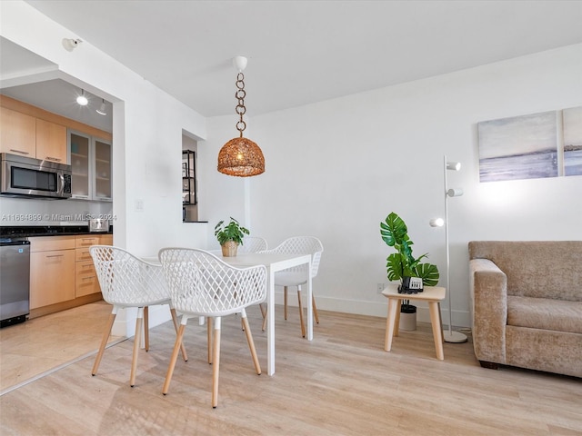 dining area featuring light hardwood / wood-style floors