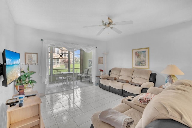 living room featuring ceiling fan and light tile patterned floors