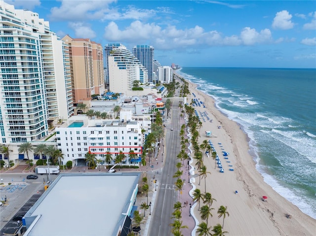 aerial view featuring a water view and a beach view