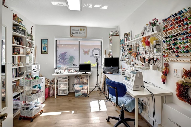 home office featuring hardwood / wood-style floors