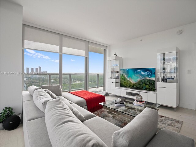 16385 Biscayne Blvd Unit 1615, North Miami Beach, FL 33160 - living room with a wall of windows