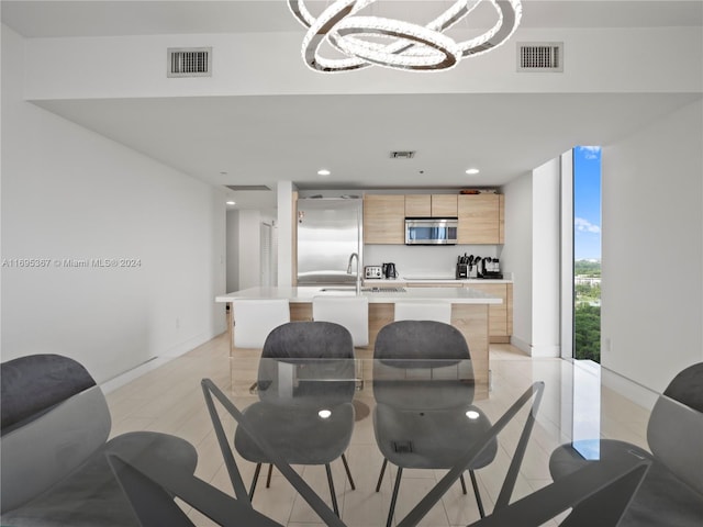 16385 Biscayne Blvd Unit 1615, North Miami Beach, FL 33160 - dining space featuring a chandelier, light tile patterned floors, and recessed lighting