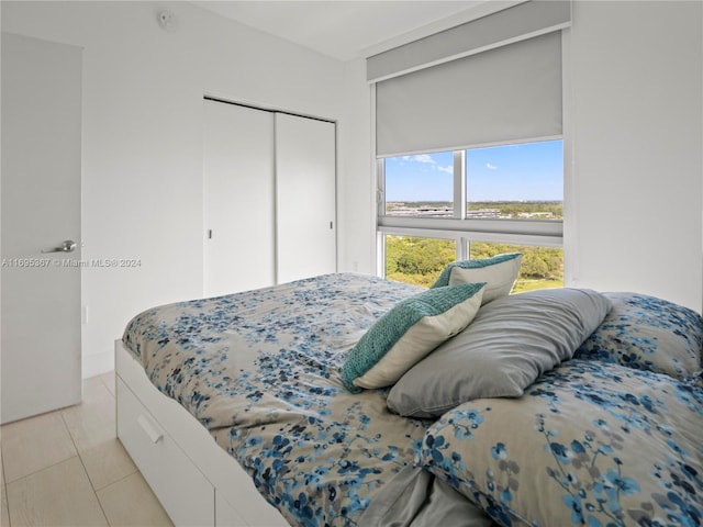 16385 Biscayne Blvd Unit 1615, North Miami Beach, FL 33160 - bedroom with a closet and light tile patterned flooring