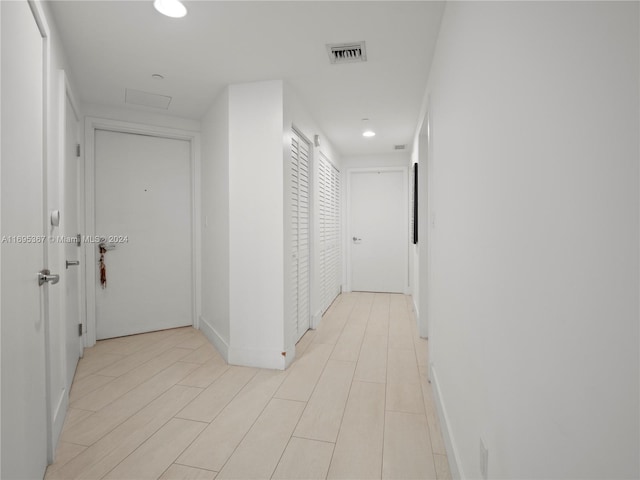 16385 Biscayne Blvd Unit 1615, North Miami Beach, FL 33160 - hallway featuring attic access and recessed lighting