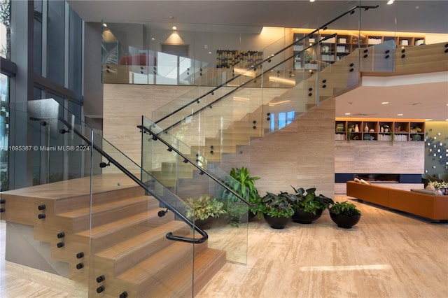 16385 Biscayne Blvd Unit 1615, North Miami Beach, FL 33160 - stairway featuring a high ceiling