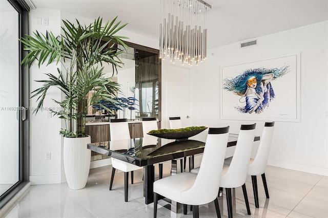 dining room featuring light tile patterned floors