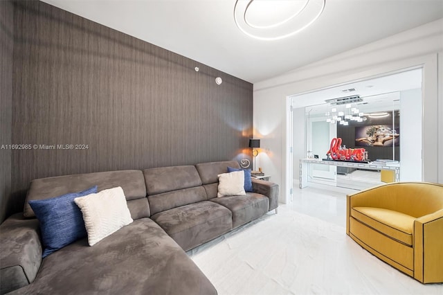 living room featuring vaulted ceiling