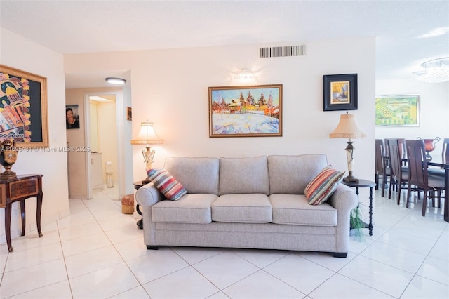 living room with light tile patterned floors