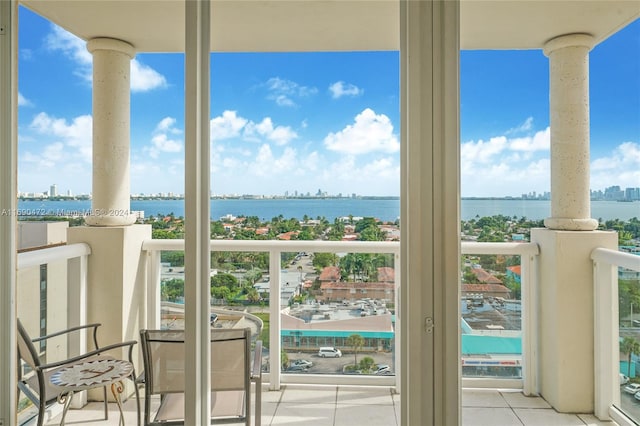 balcony featuring a water view