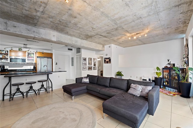 living room with light tile patterned floors