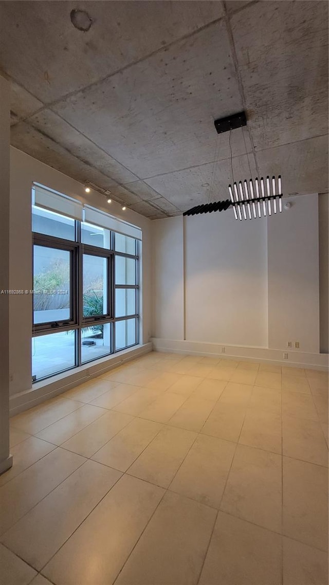 view of tiled spare room