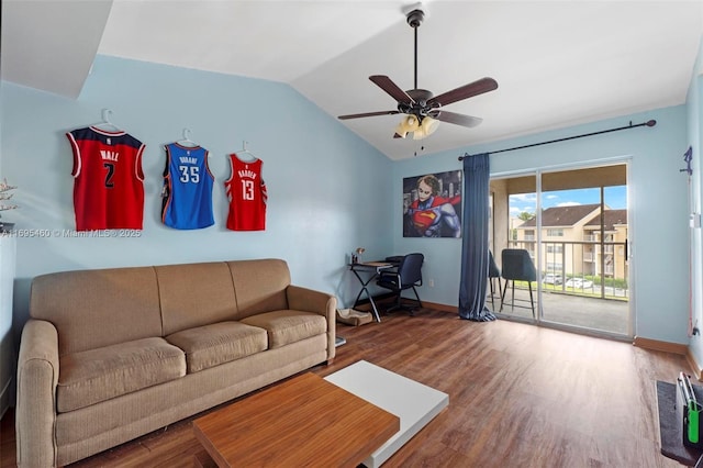 living room with ceiling fan, hardwood / wood-style floors, and lofted ceiling