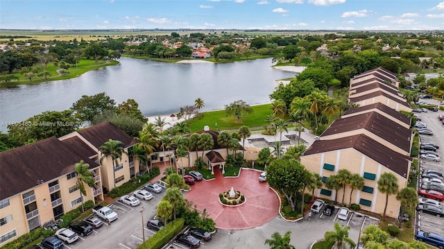 drone / aerial view with a water view