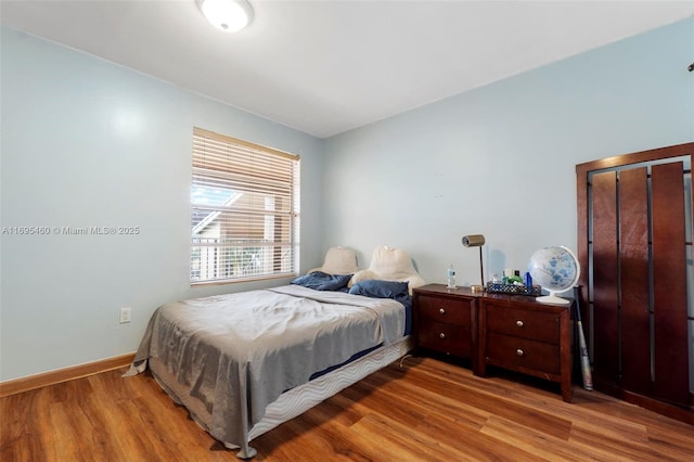 bedroom featuring hardwood / wood-style flooring