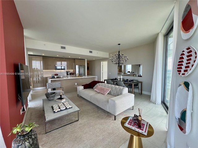 living room featuring an inviting chandelier