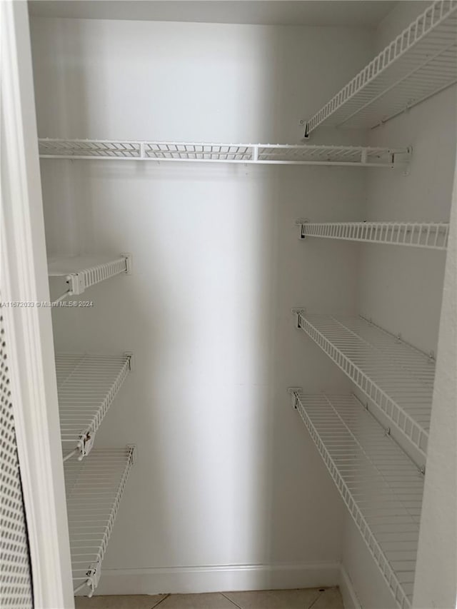 walk in closet featuring tile patterned floors