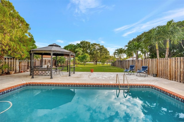 view of pool featuring a gazebo, a patio, and a yard