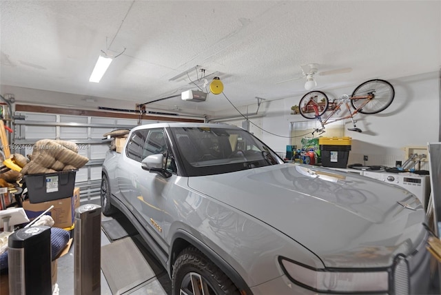 garage with ceiling fan and a garage door opener