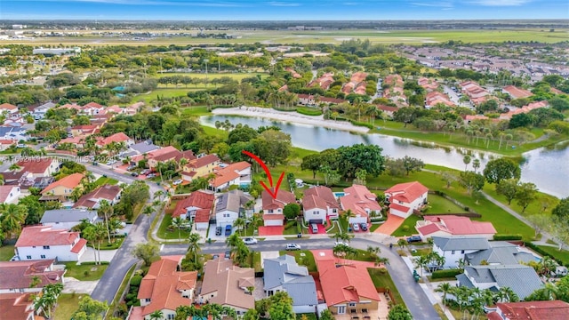 drone / aerial view featuring a water view