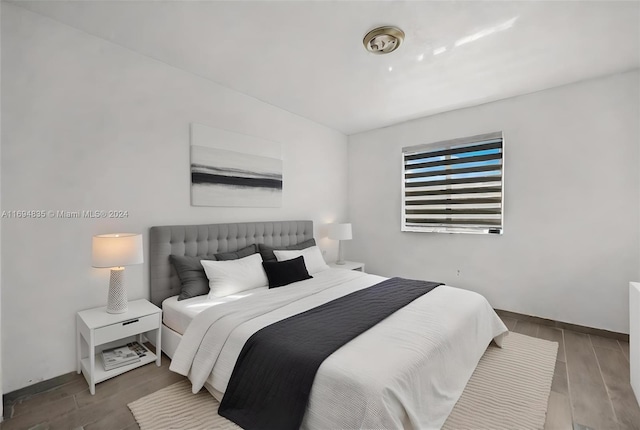 bedroom featuring hardwood / wood-style floors