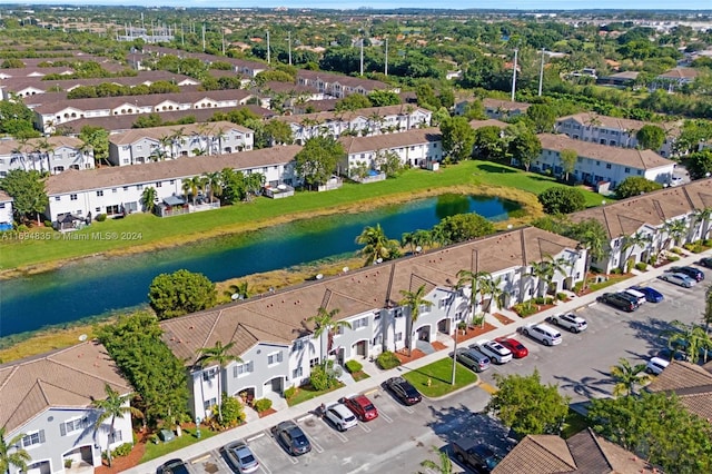 drone / aerial view featuring a water view