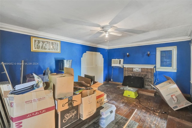 storage featuring a wall mounted air conditioner and ceiling fan