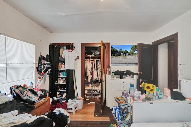 bedroom with hardwood / wood-style flooring