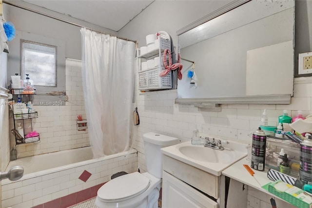 full bathroom featuring shower / bath combo, tasteful backsplash, vanity, tile walls, and toilet