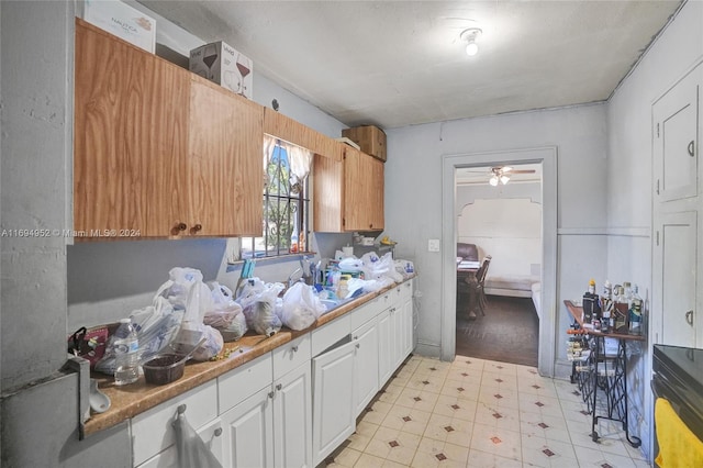 kitchen featuring white cabinetry