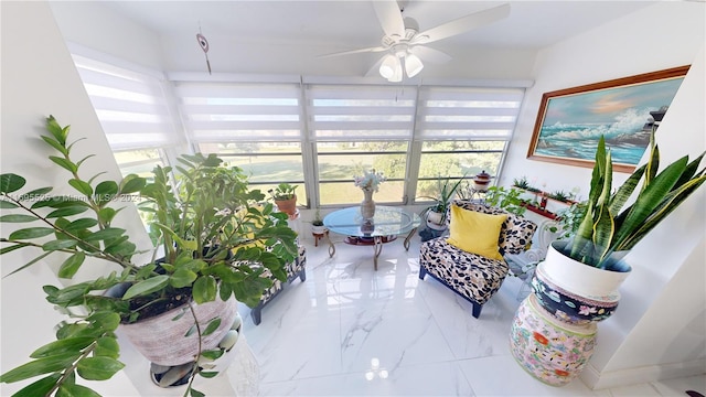 interior space featuring a wealth of natural light and ceiling fan