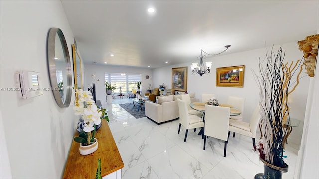 dining room with a notable chandelier