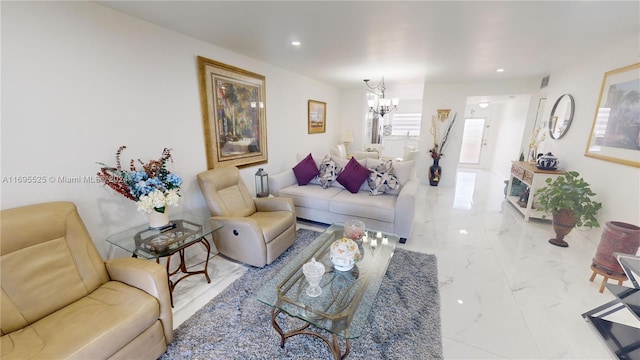 living room with a notable chandelier