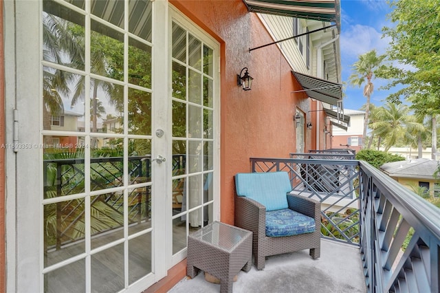 balcony featuring french doors