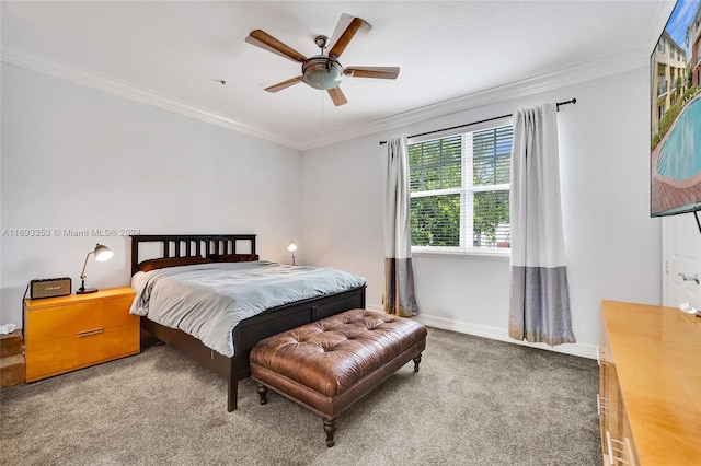 bedroom with carpet, ceiling fan, and ornamental molding