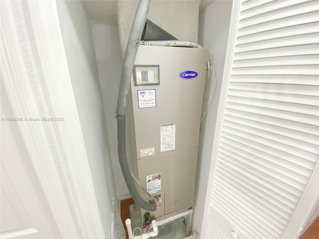 utility room with heating unit