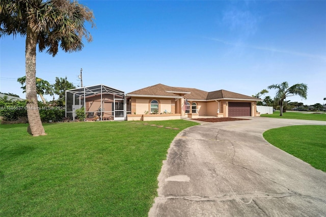 view of front facade with a front yard and a lanai