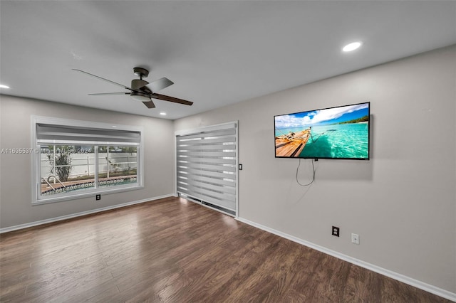 spare room featuring ceiling fan and wood-type flooring