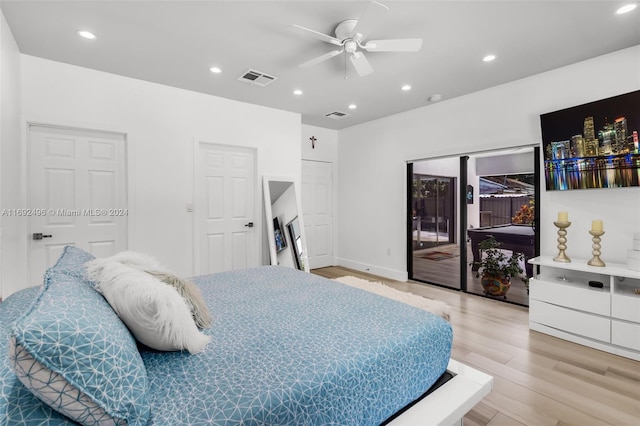 bedroom featuring access to exterior, light wood-type flooring, and ceiling fan