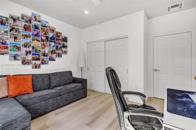 office space with light hardwood / wood-style floors