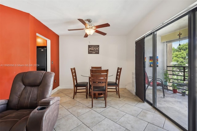 dining room featuring ceiling fan and light tile patterned flooring