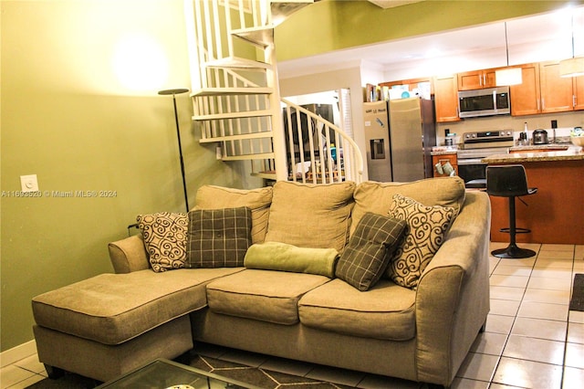 living room with light tile patterned floors