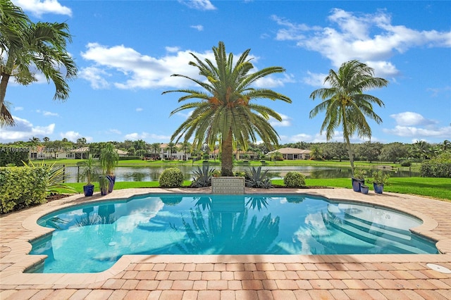 view of swimming pool featuring a water view