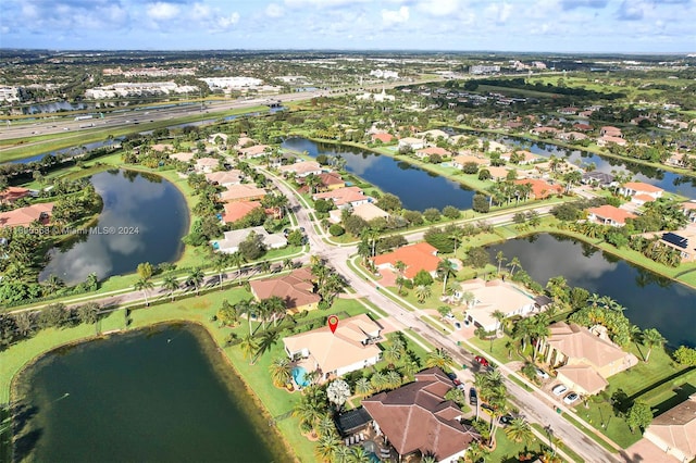 bird's eye view with a water view