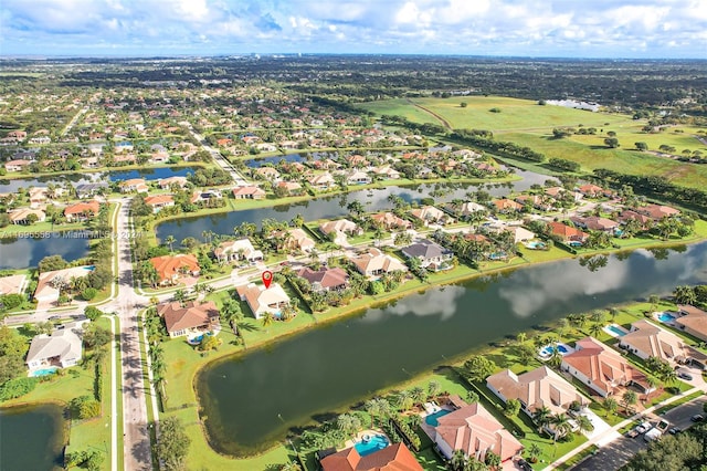 drone / aerial view with a water view