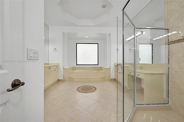 bathroom featuring vanity, separate shower and tub, and tile patterned floors