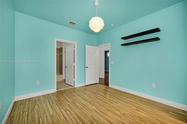 unfurnished bedroom featuring light hardwood / wood-style floors