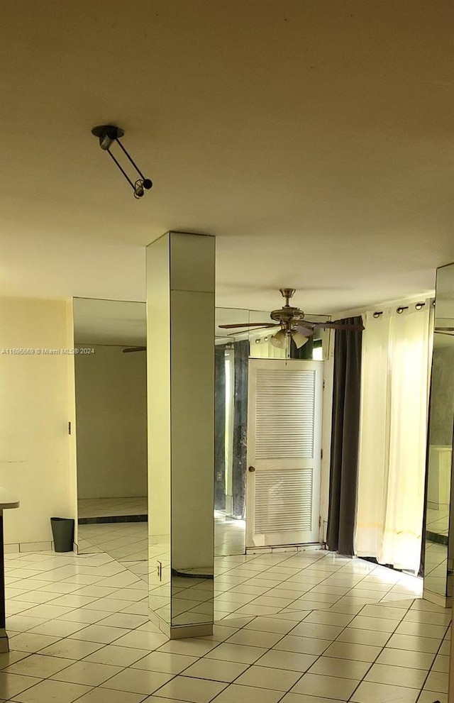 3564 Magellan Cir Unit 211-1, Aventura, FL 33180 - spare room with light tile patterned flooring and ceiling fan