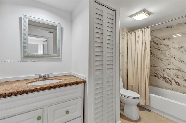 full bathroom featuring tile patterned floors, shower / bath combination with curtain, toilet, and vanity