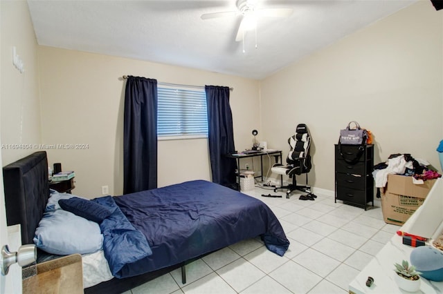 bedroom with ceiling fan and light tile patterned flooring